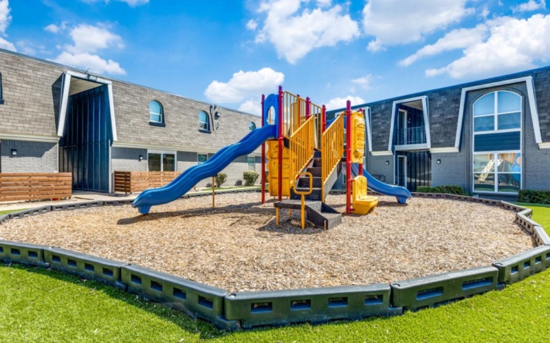 a playground in front of a building